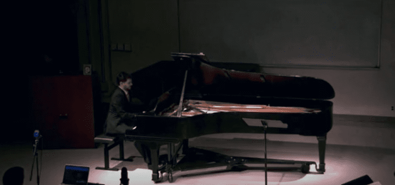 Christian Johnson performs the Rose Sonata in a studio.