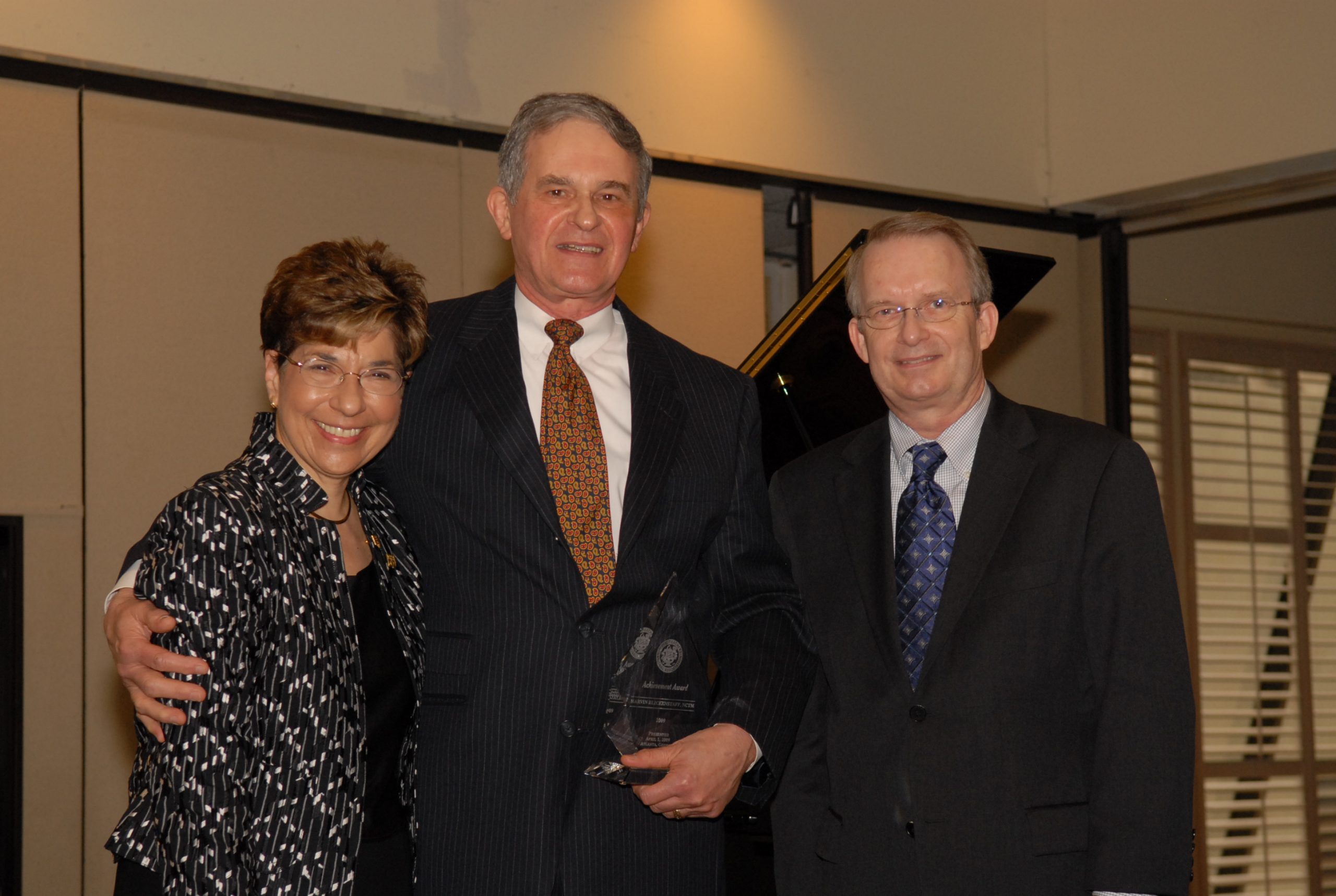 Marvin Blickenstaff receiving the MTNA Lifetime Achievement Award in 2009, with Gail Berenson and Gary Ingle. 